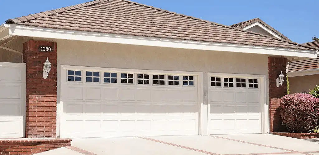 Residential garage door repair service for a double garage door in Baton Rouge, LA