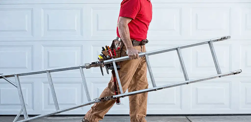 Garage door repair technician arriving with tools and ladder in Baton Rouge, LA